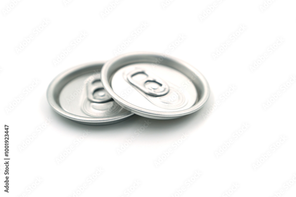 Soft drink can lid on white background, recycled material concept Soft drink can lid on white background, recycled material concept