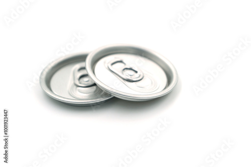 Soft drink can lid on white background, recycled material concept