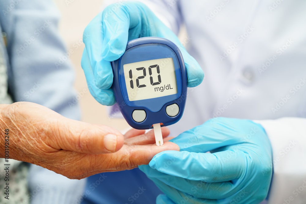 Doctor use digital glucose monitor measure and test stripe for check diabetes from finger blood sugar level. Doctor use digital glucose monitor measure and test stripe for check diabetes from finger blood sugar level.