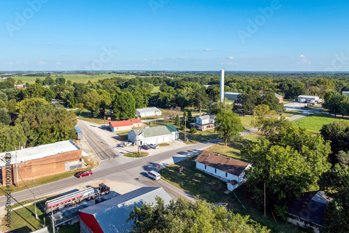 Aerial view of downtown Dadeville Missouri with water tower in background with main street in foreground.  photo