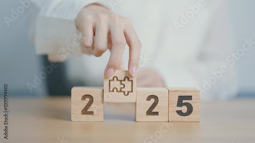 Wallpaper Mural 2025 year block with jigsaw puzzle icon. Business Process, Team, teamwork, Goal, mission, Resolution, strategy, plan, Action, partnership, and New Year start Torontodigital.ca