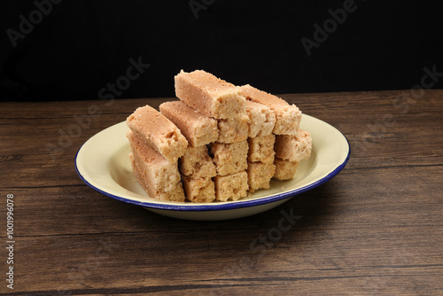 Traditional Indian Milk Cake Alwar Ka Mawa dry flaky biscuit like sweet treat photo