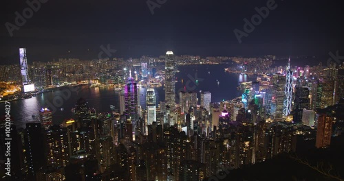 Wallpaper Mural Stunning night skyline of Hong Kongs iconic Victoria Harbour Captured from the Peak, where bright lights illuminate towering skyscrapers and the lively Victoria Harbour comes alive Torontodigital.ca