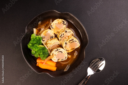 Rollade Saus Asam Manis is Sausage Chicken Egg Roll in Sweet Sour Sauce. photo