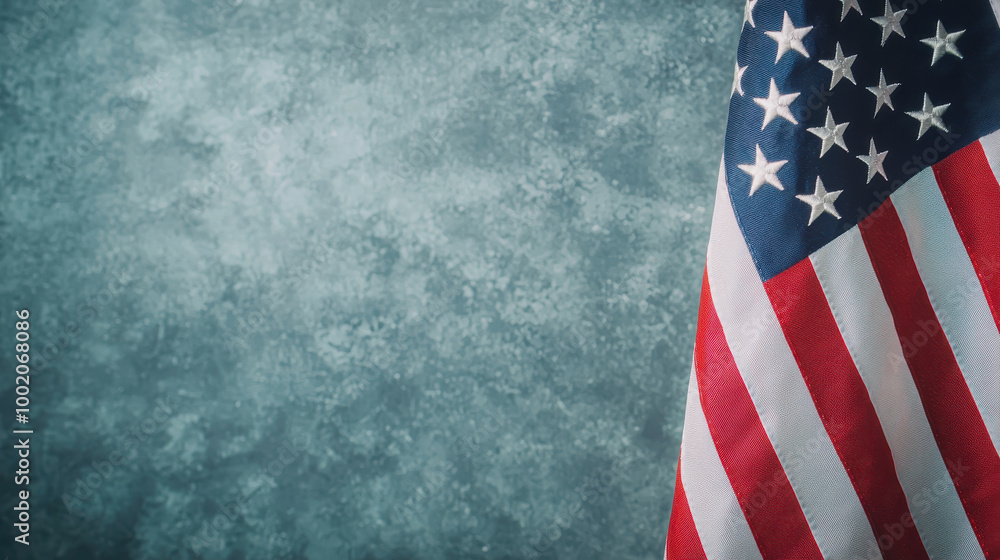 Obraz premium American flag stands proudly against textured background, symbolizing patriotism and national pride. Its vibrant colors evoke sense of unity and remembrance