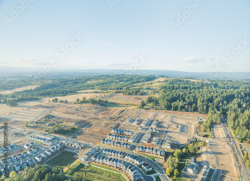 A view of a residential area with houses and trees