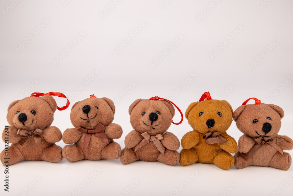 Festive Teddy Bears Displayed in a Row for the Holidays Festive Teddy Bears Displayed in a Row for the Holidays