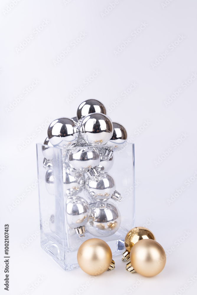 Elegant Holiday Display with Silver and Gold Ornaments Elegant Holiday Display with Silver and Gold Ornaments