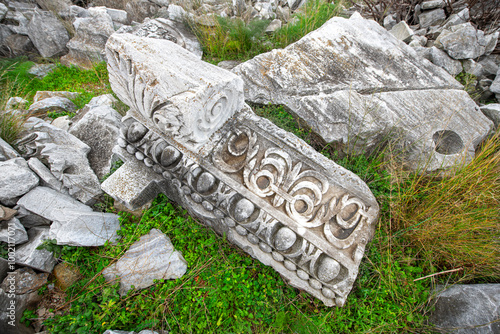 Kyzikos Ancient City is located in Erdek district. A girl watching the world's biggest Corinthian-style column head was unearthed.  
 photo