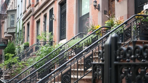 New York City townhouse building, Brooklyn Heights residential district, USA. Brownstone urban architecture, attached house. United States real estate, american property, apartments and homes in NYC.