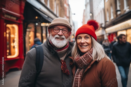 A man and woman are smiling for the camera in a city street