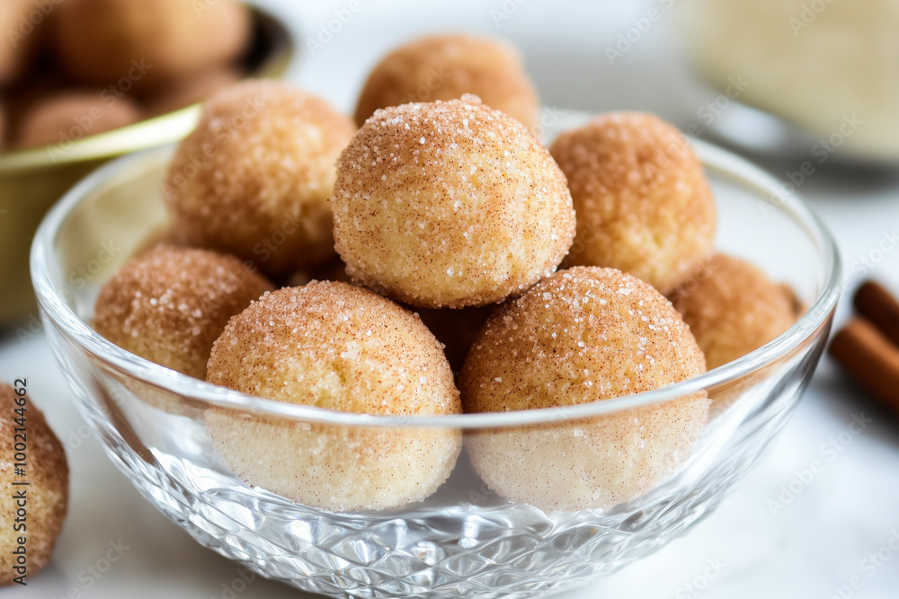 Snickerdoodle cookie bites in a glass bowl Snickerdoodle cookie bites in a glass bowl