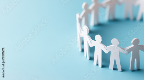 A group of people holding hands in a circle