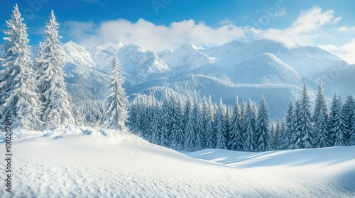 Snow-covered mountains in a winter holiday resort, with space for copy in the sky.