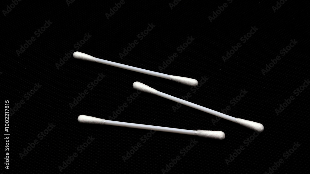 Cotton swabs isolated on black background Cotton swabs isolated on black background