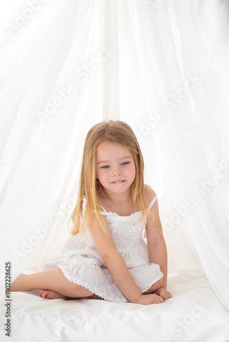 Wallpaper Mural Blond hair girl sitting in teepee Torontodigital.ca