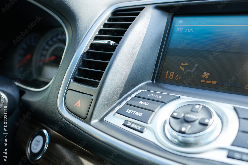 Obraz premium Interior of a modern car, detail of a car's dashboard