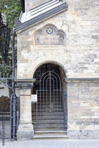 Facade of Jewish Klausen Synagogue with david star and hebrew inscription, Prague, Czech Republic photo