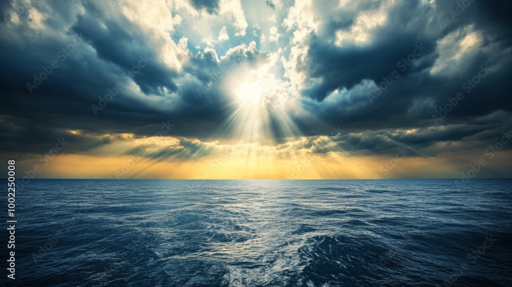 Sunbeams Through Dark Clouds Over a Calm Sea Sunbeams Through Dark Clouds Over a Calm Sea