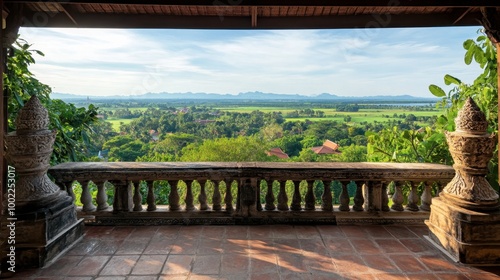 The scenic view from Wat Phra Maha Chedi Chai Mongkol terrace, overlooking the lush greenery and surrounding countryside. photo