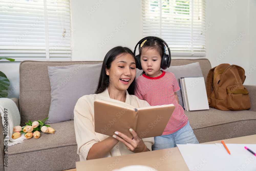Mother and Daughter Sharing a Story in a Cozy Environment Mother and Daughter Sharing a Story in a Cozy Environment
