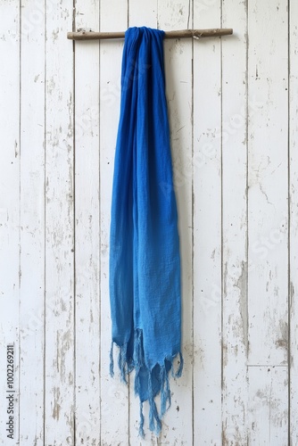 Colorful wooden planks with peeling paint in blue, white, and red arranged ve...