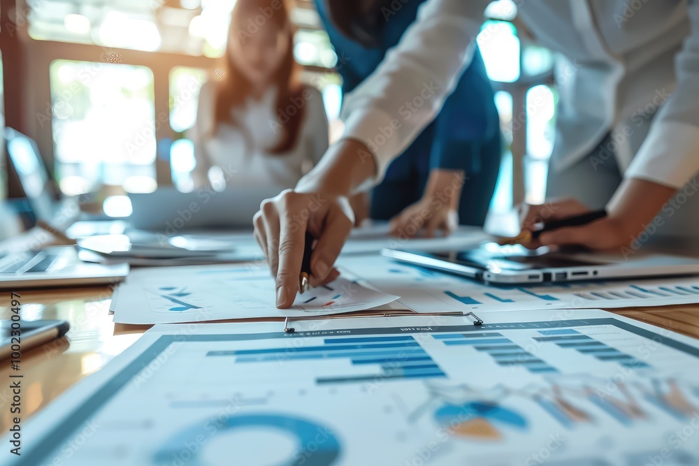 A group of multiethnic business people working together in a modern office space A group of multiethnic business people working together in a modern office space