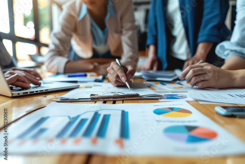 A group of multiethnic business people working together in a modern office space 