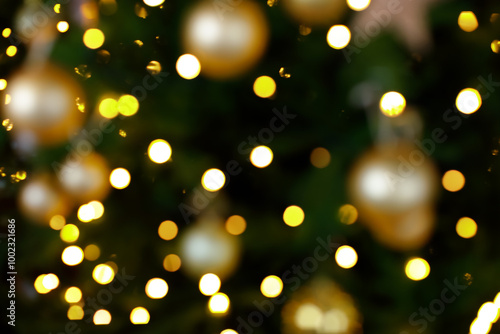 blurred christmas interior with golden lights bokeh