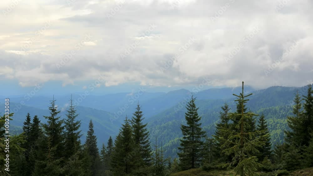 Breathtaking Mountain Landscape Under a Sky of Moving Clouds Breathtaking Mountain Landscape Under a Sky of Moving Clouds