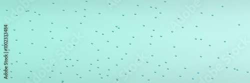 Rain transparent drops flow down the glass.Realistic wet condensation texture.Fresh water splash effect on the surface.Liquid spreading droplet shapes.