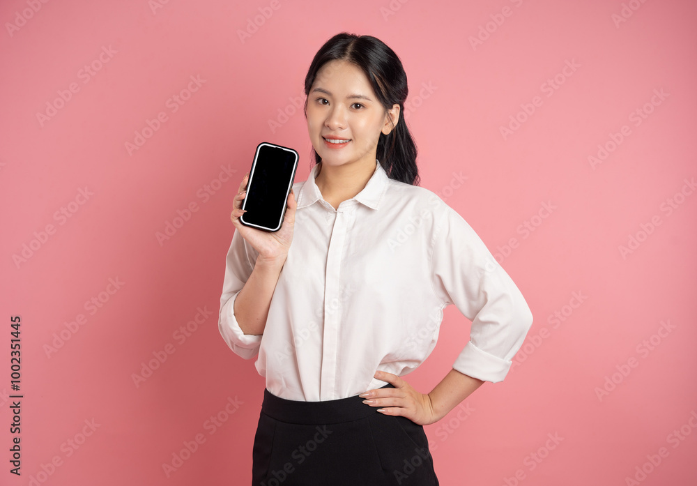 portrait of Asian business woman posing on pink background portrait of Asian business woman posing on pink background