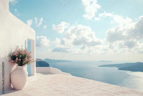 A serene view from a Santorini terrace overlooking the sparkling Aegean Sea and distant islands photo