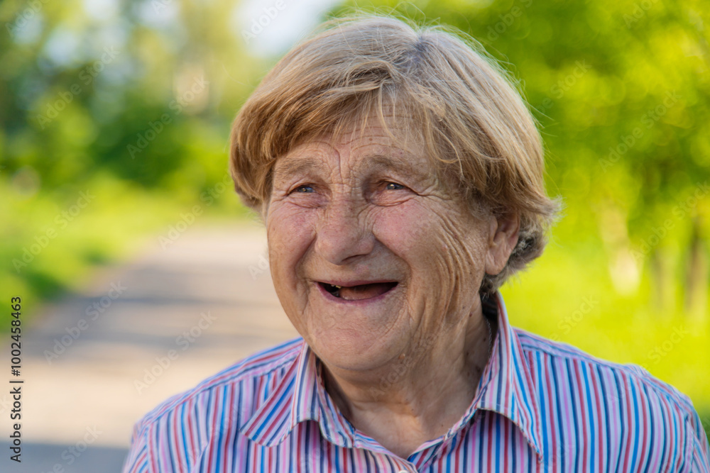 Old woman without teeth. Selective focus. Old woman without teeth. Selective focus.