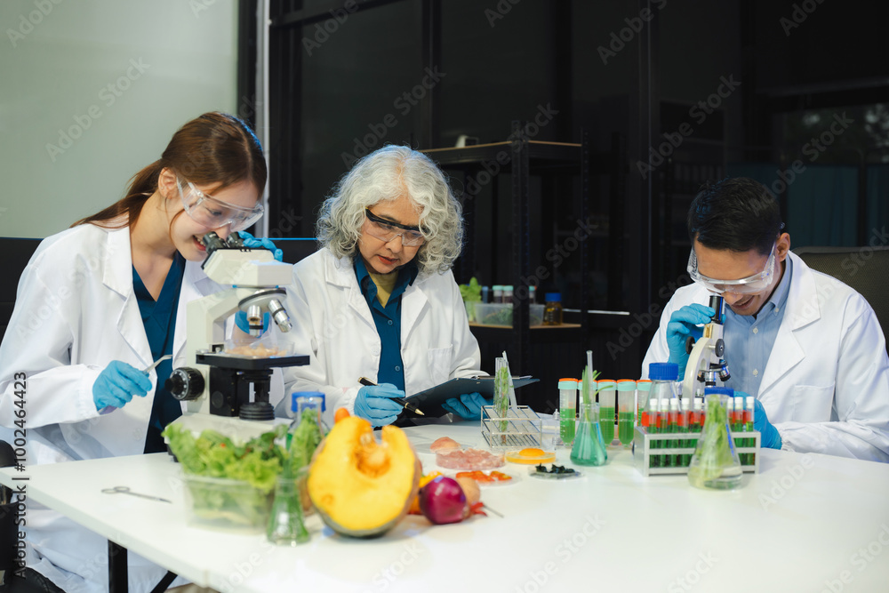Team Microbiologists Analyzing Molecular Samples in Advanced Food Science Laboratory, Dietitian food and medicine. Team Microbiologists Analyzing Molecular Samples in Advanced Food Science Laboratory, Dietitian food and medicine.