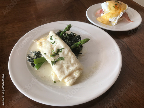 Dish of Egg white omelette served with asparagus. photo