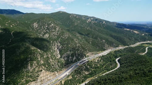 Drone Panoramic Landscape of Mediterranean Highway France Spain Borders Daylight around green hills, Aerial View photo