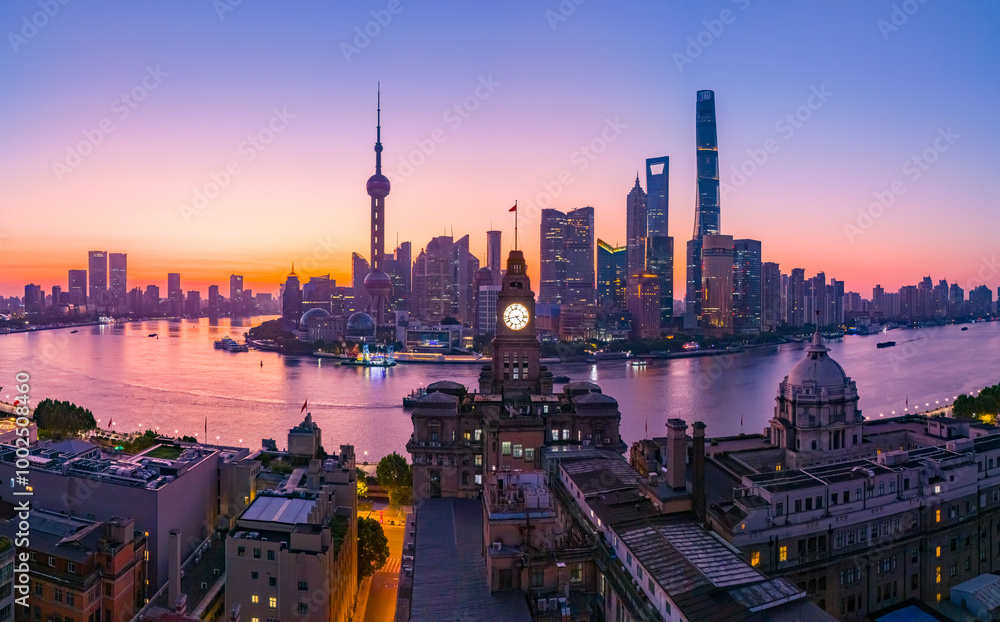 Obraz premium Aerial view of modern city skyline and buildings at sunrise in Shanghai