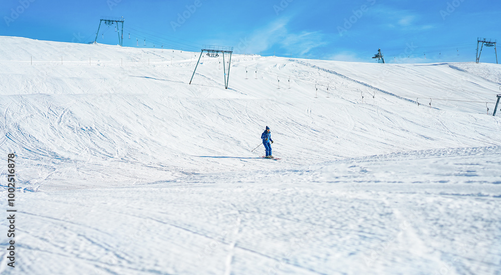Young man athlete skiing in snow mountain - Skier riding down for winter sport competition - Travel and vacation concept - Focus on his body Young man athlete skiing in snow mountain - Skier riding down for winter sport competition - Travel and vacation concept - Focus on his body