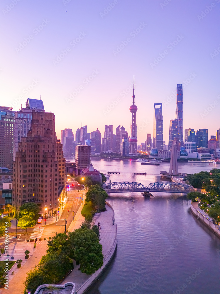 Obraz premium Aerial view of modern city skyline and buildings at sunrise in Shanghai