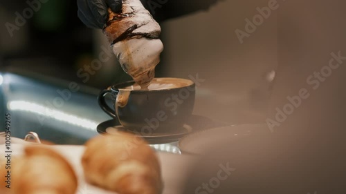 The Perfect Pair: Croissant and Cappuccino for a Sweet Treat photo