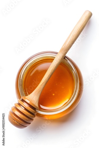 Honey and wooden spoon isolated on white background, top view