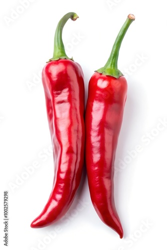 Two red chili peppers, isolated on white background