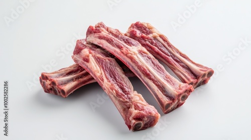 Wallpaper Mural Raw lamb ribs placed on a plain white background, showcasing their freshness and quality, perfect for meal ideas or recipe visuals. Torontodigital.ca