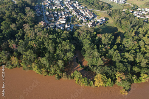 Mudy waters of flooded Catawba river nearly encroach on Rock Hill community in South Carolina after hurricane Helene photo