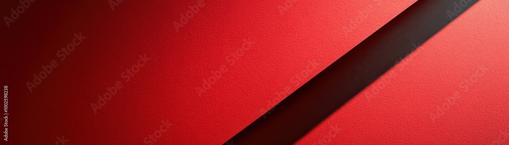 Fototapeta premium Red Surface with a Dark Diagonal Shadow