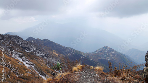 Thambi View Point offers a panoramic view of Mt. Kanchenjungha, and loops of the silk route road, Zuluk, Sikkim, India photo