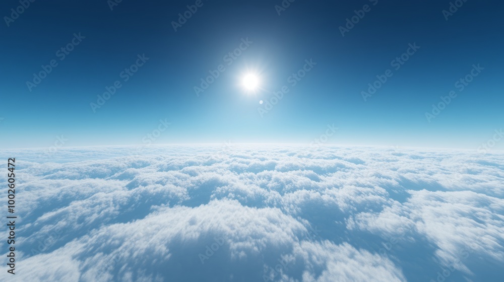 Above the clouds, with a vivid blue sky