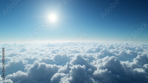 Above the clouds, with a vibrant blue sky photo