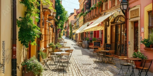 Fototapeta Naklejka Na Ścianę i Meble -  Street Cafe: A quaint European street with outdoor cafes and tables